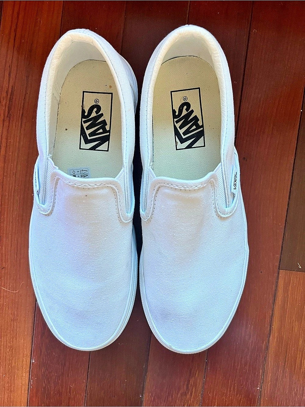 Vans Women's White Slip-On Sneakers